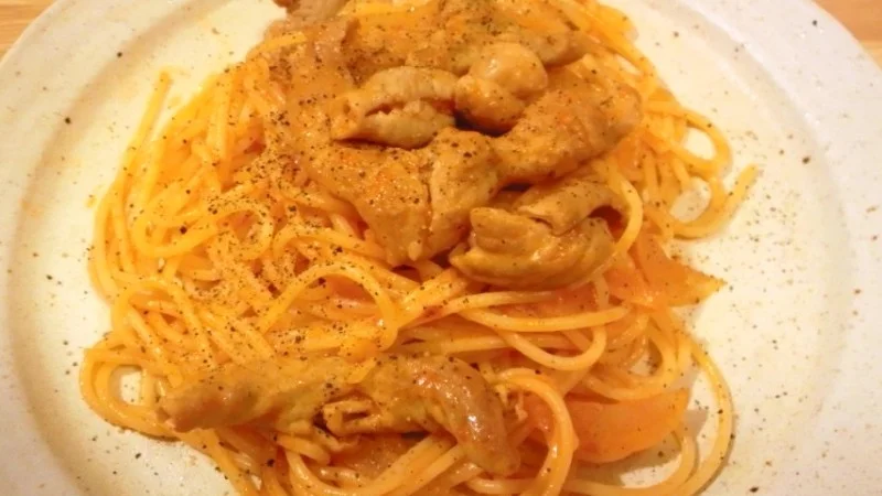 豚白モツのトマト煮込みのスパゲッティ